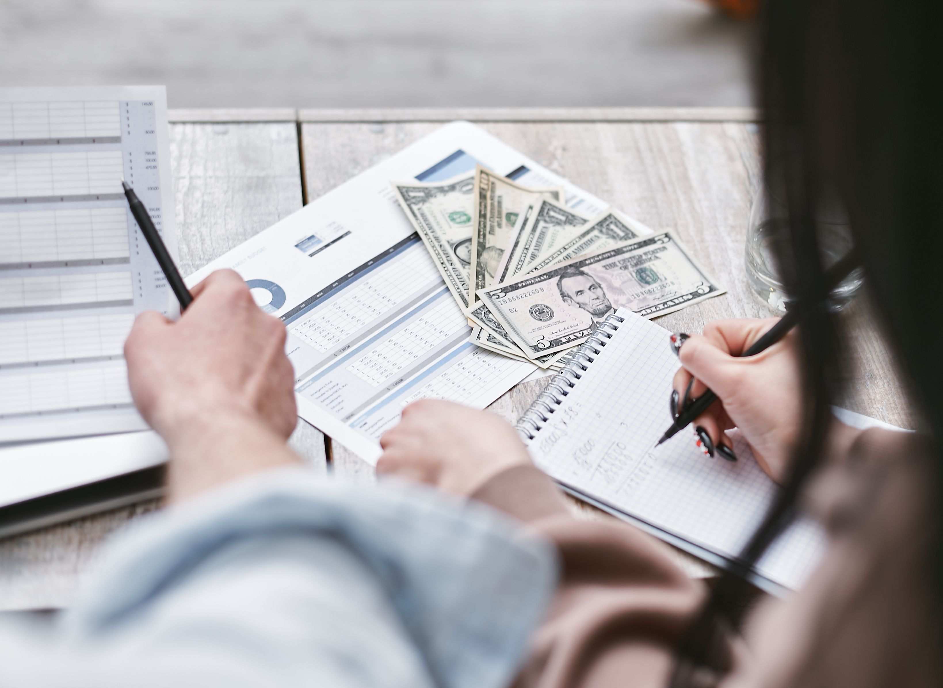 Financial documents and records spread out for budgeting